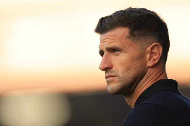 John Mousinho has criticised his side's performance in their 2-1 defeat to Reading in the Carabao Cup. Picture: Simon Roe/ProSportsImages