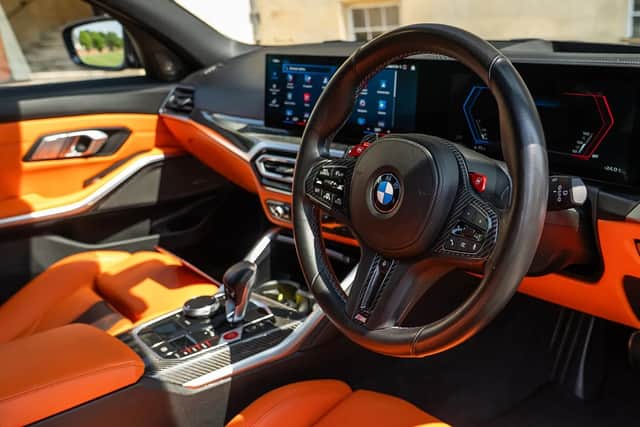 The contrasting orange interior is a particular highlight of this particular vehicle