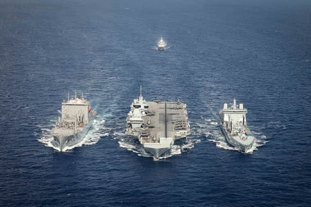What next for the Royal Navy flagship HMS Prince of Wales as she reaches a critical stage of her deployment. Ships left to right: US cargo ship USNS Wally Schirra, HMS Prince of Wales and RFA Tidespring.