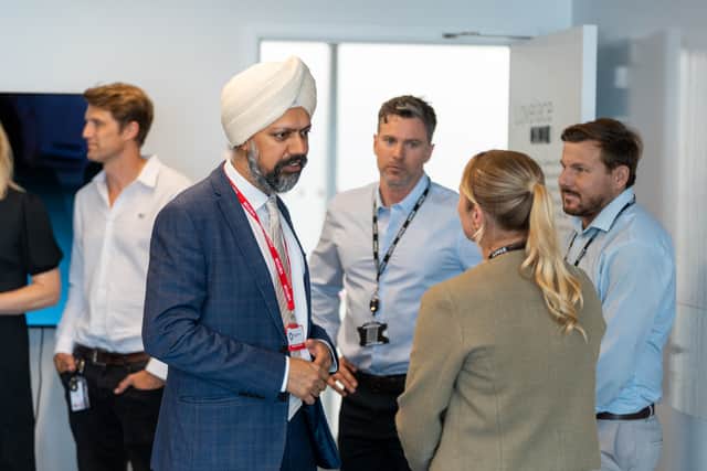 Tanmanjeet Singh Dhesi speaking to representatives of Subsea Craft.