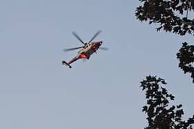 A man has died at the scene of a serious boat crash in the Tipner area of Portsmouth. Another male was rushed to hospital, while a third is still missing. An emergency helicopter is currently searching for him.