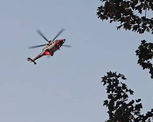 A man has died at the scene of a serious boat crash in the Tipner area of Portsmouth. Another male was rushed to hospital, while a third is still missing. An emergency helicopter is currently searching for him.