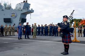 The ship's company of HMS Prince of Wales, accompanied by the Chaplain from HMS Dauntless, gathered on the flight deck to mark the end of the Second World War and pay respects to all those who lost their lives.