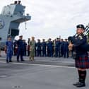 The ship's company of HMS Prince of Wales, accompanied by the Chaplain from HMS Dauntless, gathered on the flight deck to mark the end of the Second World War and pay respects to all those who lost their lives.