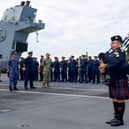 The ship's company of HMS Prince of Wales, accompanied by the Chaplain from HMS Dauntless, gathered on the flight deck to mark the end of the Second World War and pay respects to all those who lost their lives.