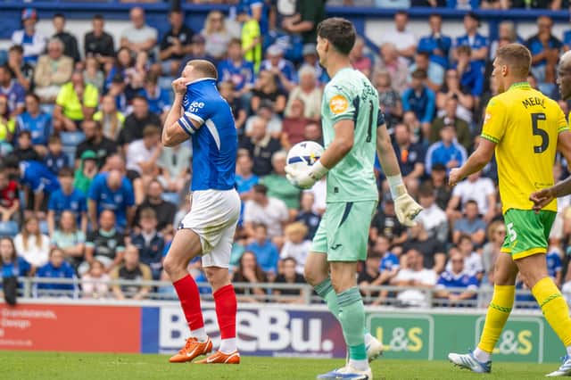 Colby Bishop is in agony after his late Pompey penalty miss in their 2-1 defeat to Norwich. Picture: Steve Bailey/ProSportsImages