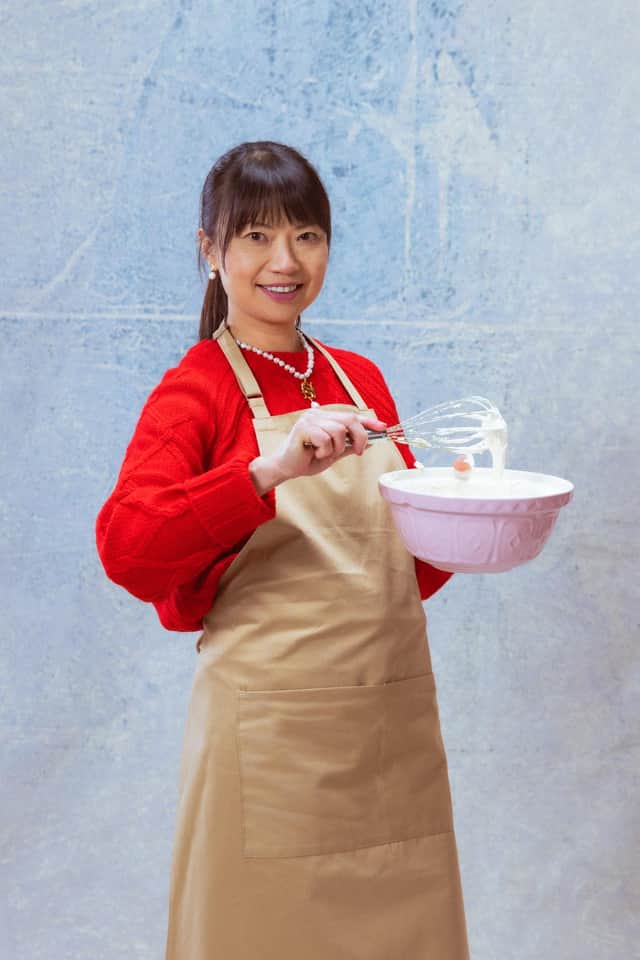 51-year-old bridal designer Pui Man was born in Hong Kong and now lives in Essex with her husband and two children. Her bakes are as beautiful as they are bold, and she practices endlessly to make sure her creations are as close to perfection as possible. While the other bakers may dream of a Hollywood handshake, Pui Man’s got her eye on the show’s first ever Hollywood hug.