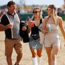 Crowds enjoying a cold drink on a warm start to Victorious Festival.