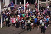 People take part in a counter protest to the Stand Up To Racism rally in Guildhall Square, Portsmouth on August 22