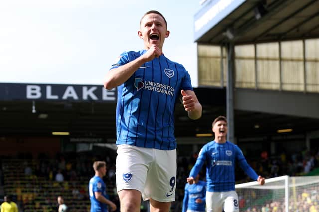 Hat-trick hero Colby Bishop celebrates in front of the away fans at Carrow Road last season