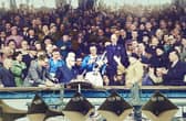 Field Marshall Bernard Montgomery (in beret) presents the first division trophy to Portsmouth FC captain Reg Flewin in the Directors’ Box of the South Stand in April 1949. Portsmouth were champions of England for two seasons in a row, they retained the title in 1950, a feat only achieved by six clubs since World War Two: Wolves, Liverpool, Manchester United, Chelsea and Manchester City are the others. Photographer: Unknown (colorised by Andy Imrie) / Pompey History Society Archive
