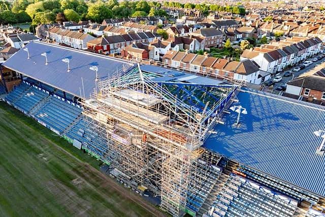 Construction work on the new state-of-the-art TV gantry at the historic South Stand of Portsmouth FC in the summer of 2024. Photographer: Marcin Jedrysiak / Pompey History Society Archive