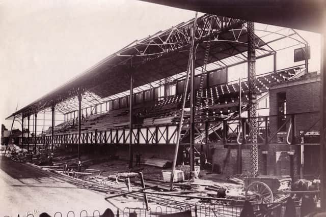 The historic double-decker South Stand at Fratton Park, designed by Archibald Leitch and the oldest surviving one of its type in the UK, under construction in the summer of 1925. It took ten weeks to complete and opened on August 29, 1925. Photographer: Stephen Cribb / Pompey History Society Archive