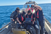 Royal Navy personnel testing futuristic underwater drones that can protect undersea cables from harm. This took place during Exercise Talisman Sabre, which saw HMS Prince of Wales take part in a huge operation.