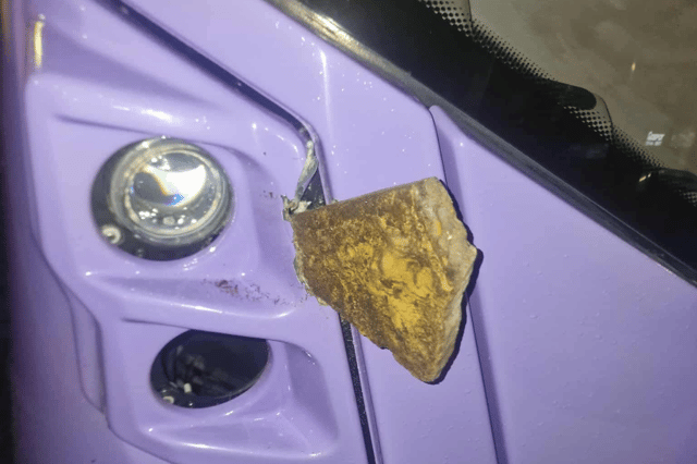 Picture of a stone buried in the front of an E1 bus in Gosport. Increased levels of vandalism has seen First Bus operating less vehicles on the BRT Busway.