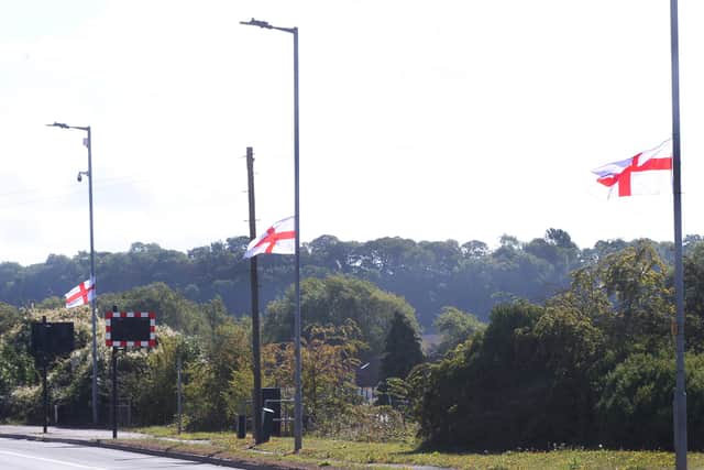 England flags on lampposts.