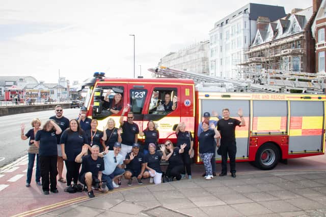 Pictured: Baton bearers and team near South Parade Pier, Portsmouth
Picture: Habibur Rahman