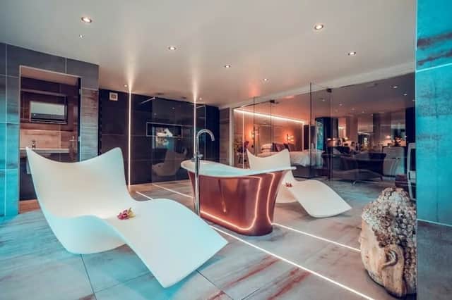 This spa-inspired suite blends glamour and serenity – with its copper bath, ambient lighting and sleek loungers, it’s a space designed purely for indulgence