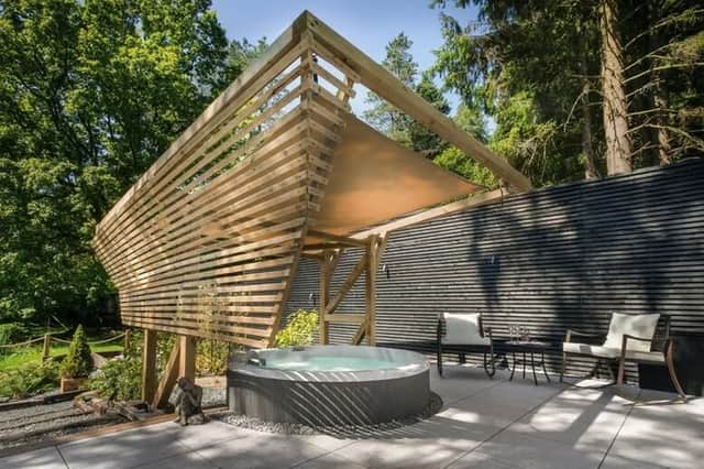 Many of the suites feature private outdoor hot tubs like this – tucked into tranquil woodland settings, perfect for an unforgettable romantic escape