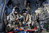 Medical personnel embarked on HMS Prince of Wales carrying out an intense casualty evacuation drill.