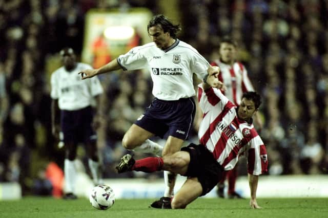 Scott Hiley in action for Southampton in May 1999, challenging Spurs' David Ginola. Picture: Laurence Griffiths /Allsport
