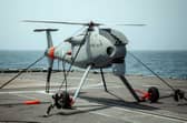 Pictured: A Peregrine Rotary Wing UAV (operated by 700X Naval Air Squadron) tethered to the flight deck of HMS Lancaster during trials in the Gulf of Oman. Two drone operations are to be rolled out for Royal Navy and Royal marines operation.