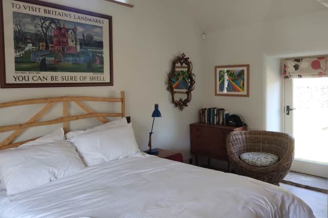 The large ensuite bedroom opens directly onto to the garden