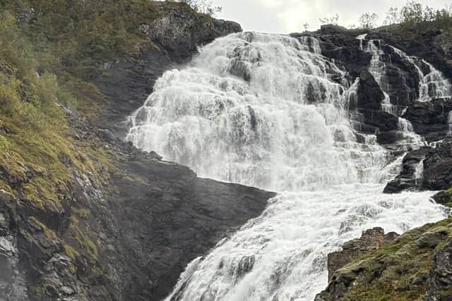 Kjosfossen waterfall in Flam, seen from the famous railway route