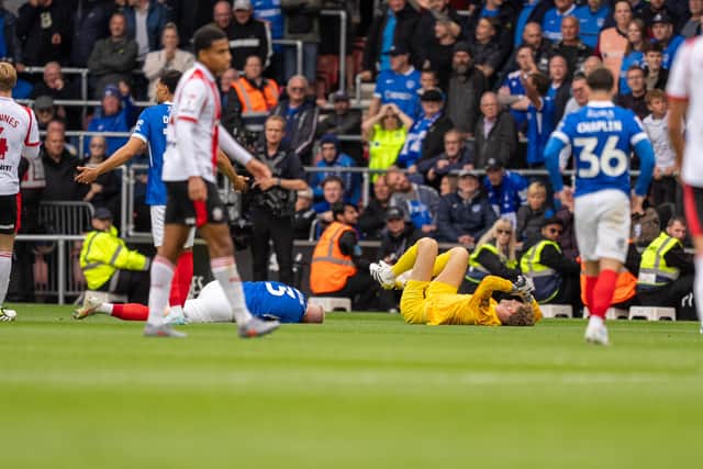 Nicolas Schmid and Connor Ogilvie went off injured during Sunday's south-coast derby.