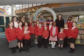 Newtown C of E Primary School in Queen's Road, Gosport, officially opened their new library by local author from Stubbington Johnny Pearce.


Pictured is: (back l-r) Caroline Oakes, assistant headteacher and English lead, Emma Howlett, headteacher, author Johnny Pearce, Beaulah Lowry, librarian and Jade Furlonger, assistant headteacher and English lead with just some of the children.


Picture: Sarah Standing (120925-9089)