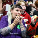 Sam Whitehead and Molly Davis tuck in to some delicious treats at the Portsmouth Vegan Festival.