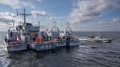 The Royal Navy Coastal Forces Squadron exercised with units of the Latvian Navy off the coastal town of Mersarags. HMS Pursuer [P273], HMS Dasher [P280] and HMS Puncher [P291] rafted up to the Latvian minehunter LVNS Imanta.