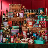 Fortnum & Mason’s Sovereign Hamper, priced at £2,500, includes 58 luxury items ranging from champagne and whisky to puddings, biscuits, truffles and festive decorations.