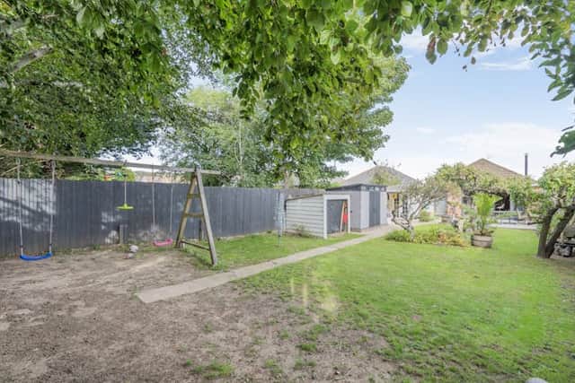 The private rear garden has french door access