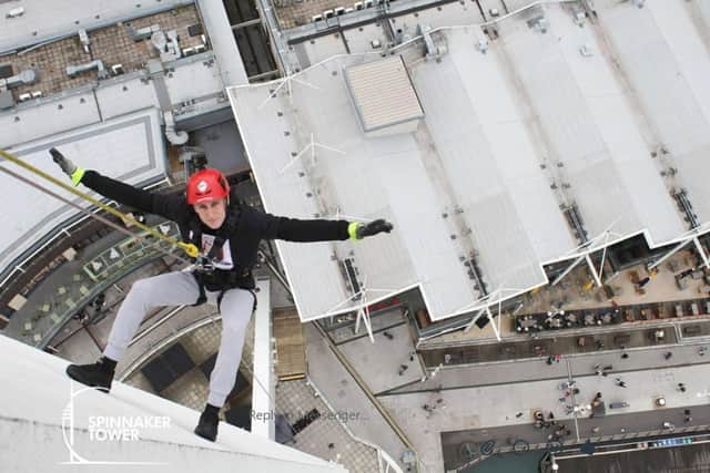 Samuel Hill abseils down Spinnaker Tower