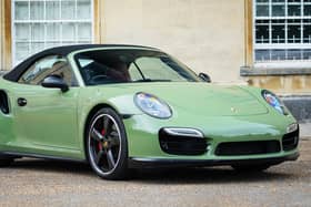 The unusual Battle Green colour really sets this car off
