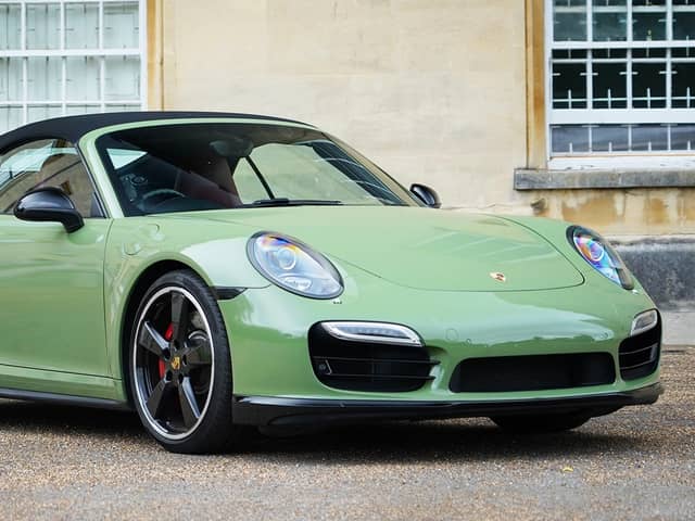 The unusual Battle Green colour really sets this car off