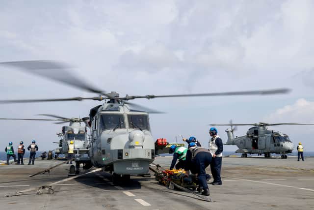 07 Sep 2025 - A Wildcat Helicopter from 815 Naval Air Squadron, currently embarked on the Norwegian Frigate HNoMS Roald Amundsen, lands on UK Carrier HMS Prince of Wales to embark a Sea Venom medium-weight anti-ship missile.