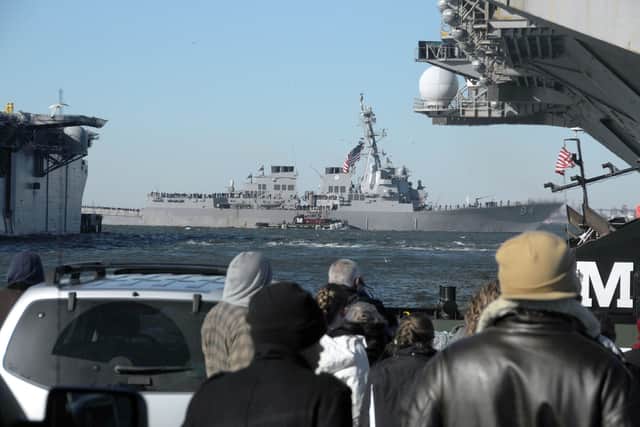 The guided-missile destroyer USS Bulkeley (DDG 84) passes visited Portsmouth today after being assigned to a Nato mission. Pictured is the warship in 2011 passing the aircraft carrier USS Enterprise (CVN 65) before leaving for a deployment from Norfolk, Virginia.
