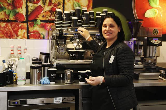 An assistant serves coffee in a Marks & Spencer café. M&S is set to close 11 cafes in smaller food shops to free up space for popular products (Photo: Ker Robertson/Getty Images)