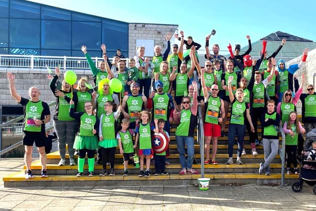 Pictured: A huge group of excited participants taking part in the Great South Run in 2023 for the Portsmouth Down Syndrome Association.