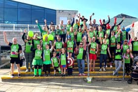 Pictured: A huge group of excited participants taking part in the Great South Run in 2023 for the Portsmouth Down Syndrome Association. 