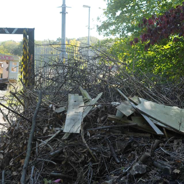 Piles of "ready made" bon fires can be found at the site with piles of wood and rubbish littered around the site. Neighbouring businesses are concerned the next fire could spread to them.