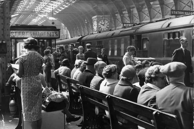Waiting for a train in the early 60s, when rail travel was considerably cheaper than it is today