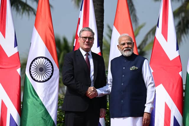 Prime minister Keir Starmer is greeted by prime minister of India Narendra Modi on his arrival at Raj Bhavan on October 9, 2025 in Mumbai. A £350 missile deal has been signed amid the arrival of HMS Prince of Wales and the UK Carrier Strike Group.
