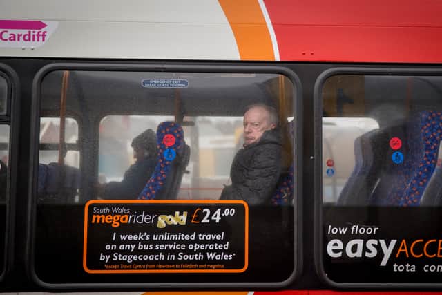 A man looks out from the window of a bus at the town's bus station in Merthyr Tydfil, Wales. Pensioners in England must now wait until age 67 to get a free bus pass (Photo: Matt Cardy/Getty Images)