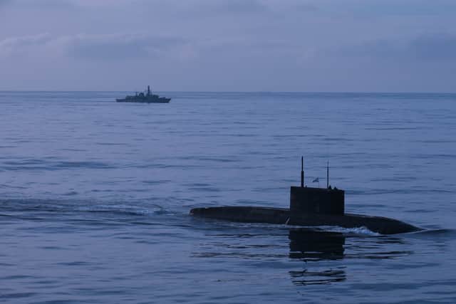 HMS Iron Duke monitored the surfaced Russian Kilo-class submarine Novorossiysk 1