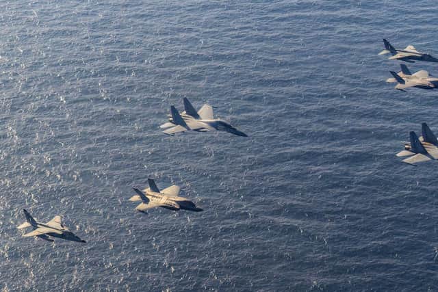 Indian Air Force Su27s and 2 Jaguars plus two UK F-35Bs pass over the Arabian Sea. This marked the end of HMS Prince of Wales' visit to India.