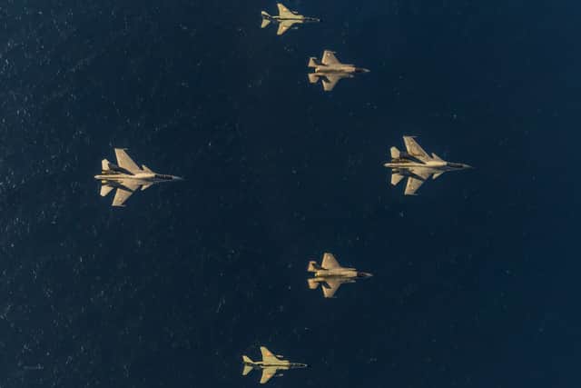 2 Indian Air Force Su27s and 2 Jaguars plus two UK F-35Bs seen from above over the Arabian Sea