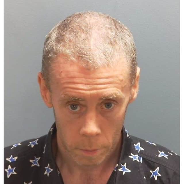 Philip Rooney, 48, was jailed for 14 months for sexual assault and assault.